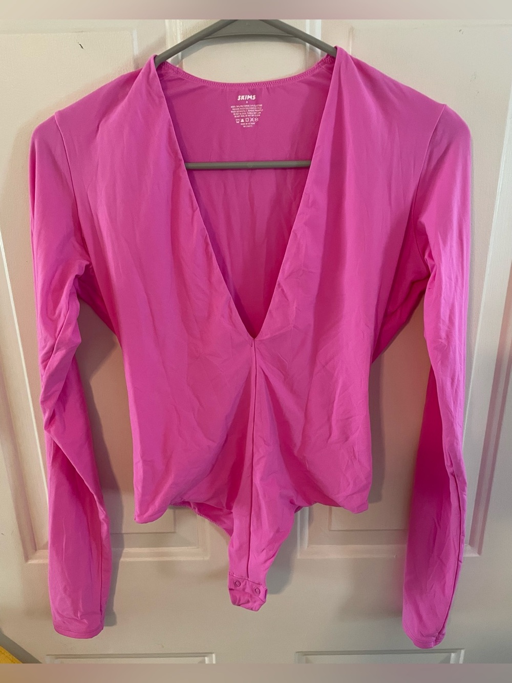 SKIMS vibrant pink bodysuit